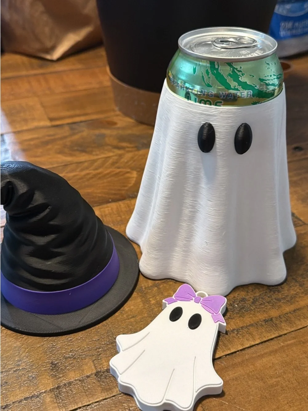 Ghost Can Koozie with Witch Hat and can opener.